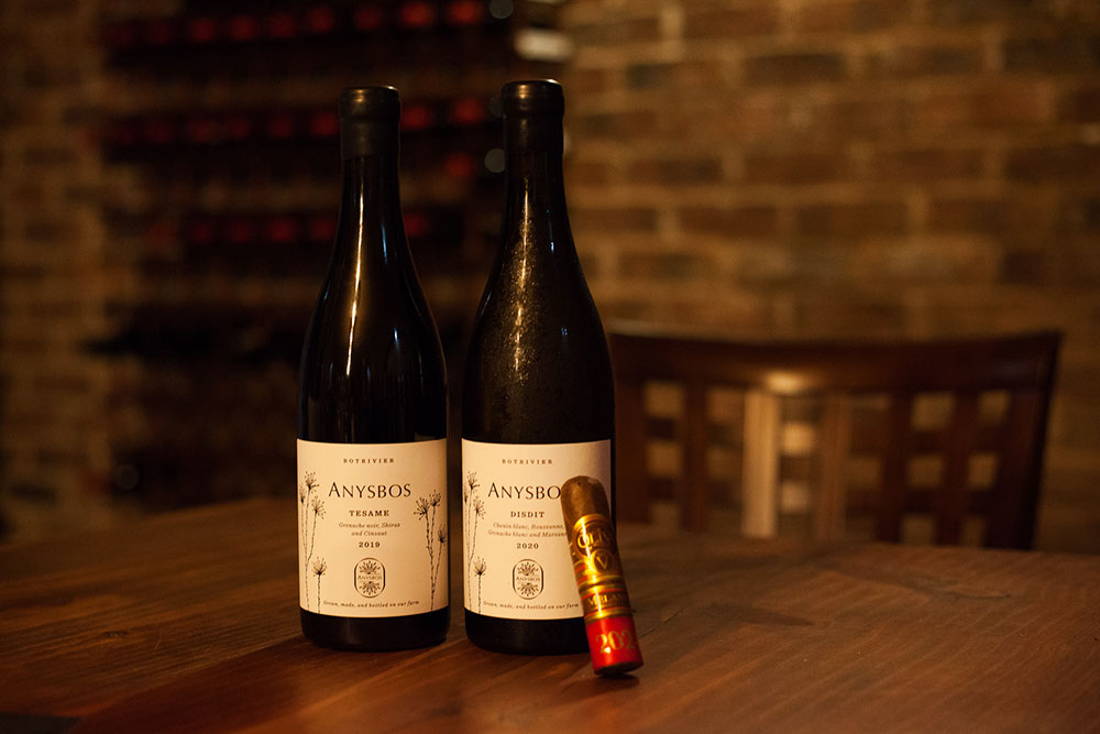 Serie V Melanio LE 2021 and Anysbos wine pairing in a hidden cellar